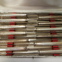Série de 12 couteaux de table argent