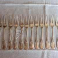 Lot de 12 fourchettes à escargots en argent massif – Poinçon Minerve