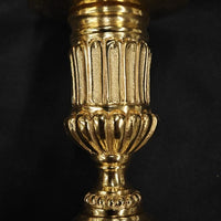 Paire de flambeaux en bronze Louis XVI doré