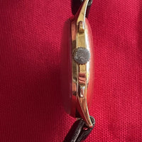 Montre Baume & Mercier chronographe en or 18K