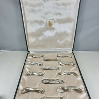 Ensemble de 12 porte-couteaux Christofle Gallia en métal argenté