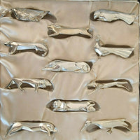 Ensemble de 12 porte-couteaux Christofle Gallia en métal argenté