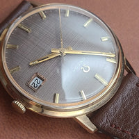 Montre oméga Genève or 18k