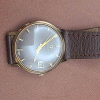 Montre oméga Genève or 18k