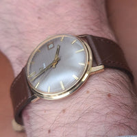 Montre oméga Genève or 18k