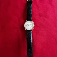 Montre Baume & Mercier chronographe en or 18K