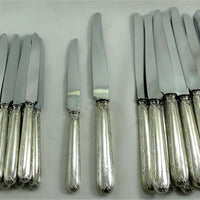 Coffret de 24 couteaux argent fourré modèle Rubans Minerve