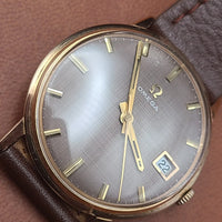 Montre oméga Genève or 18k